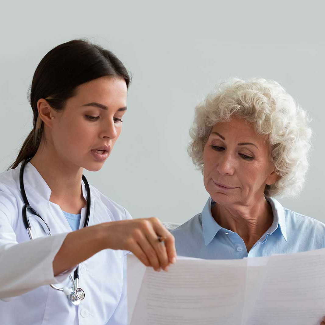 Doctor Advising Elderly Lady
